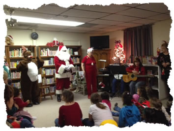 Rudolph reads to the children